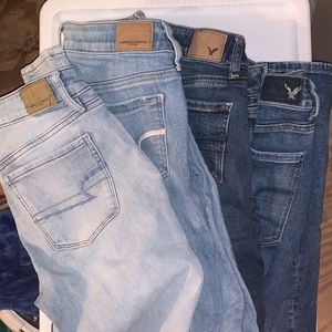 4 pairs of American Eagle Jeans